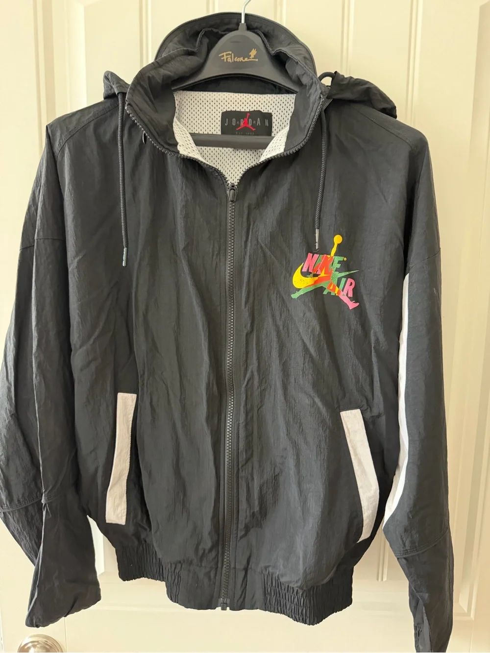 Jordan Black Hooded Windbreaker with Multicolor Logo Accent
